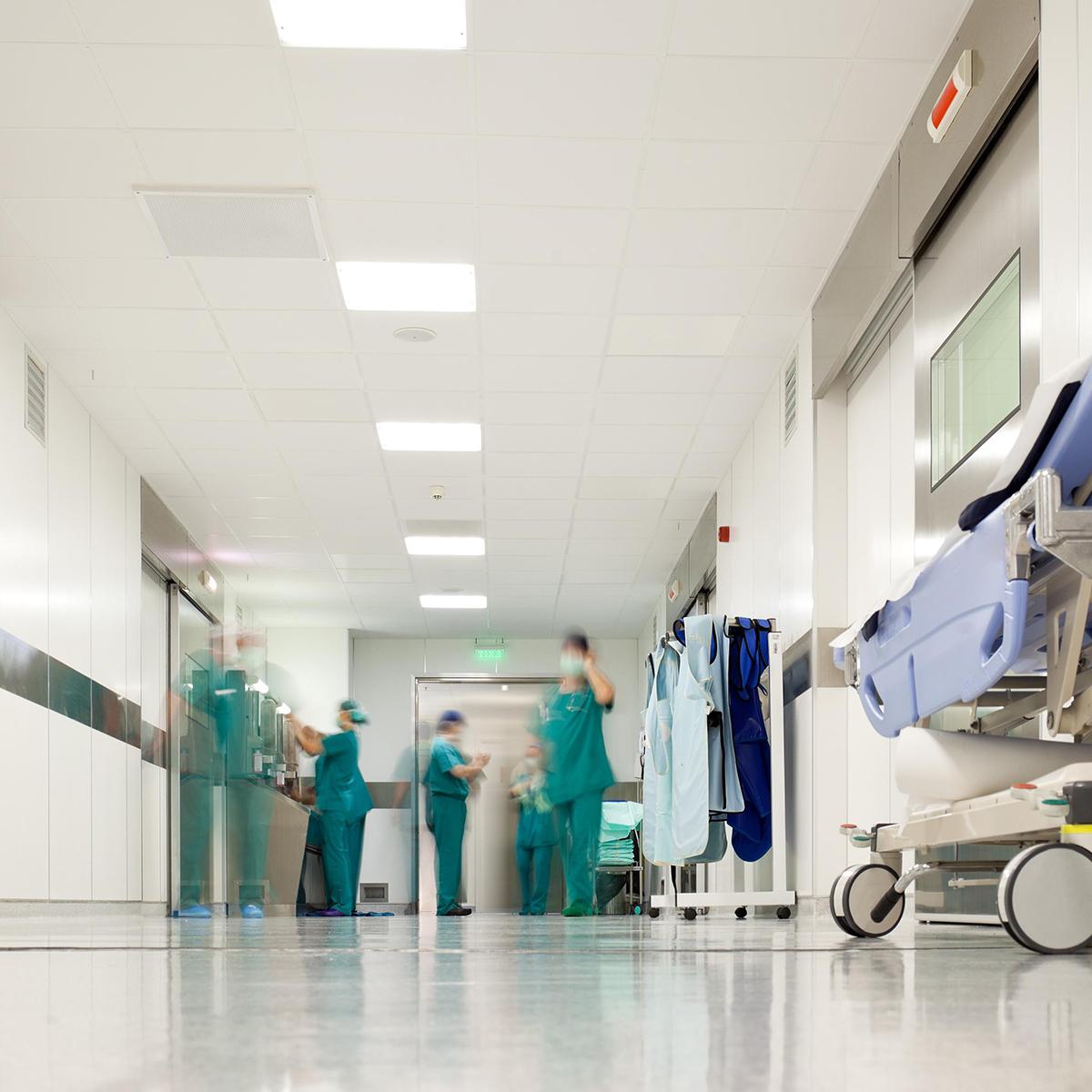 Blurred photo of a busy hospital corridor