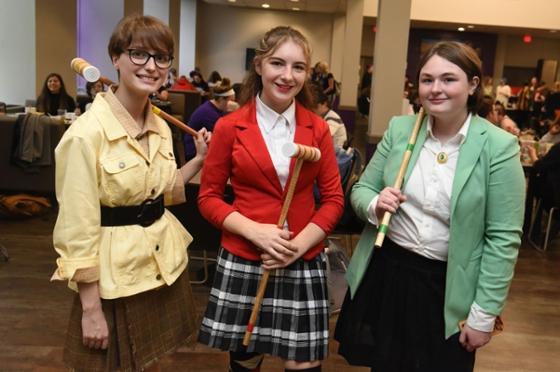 Photo of Chatham University students dressed up for Halloween as the three Heathers from the Winona Ryder movie, Heathers