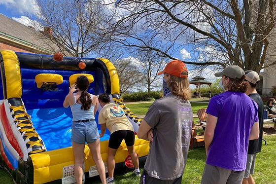 Photo of students playing a game on the quad during the spring carnival